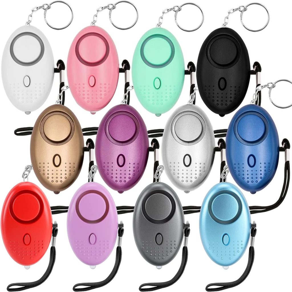Safe Sound Personal Alarm 12 pack with all color variations white pink green black gold purple silver blue red