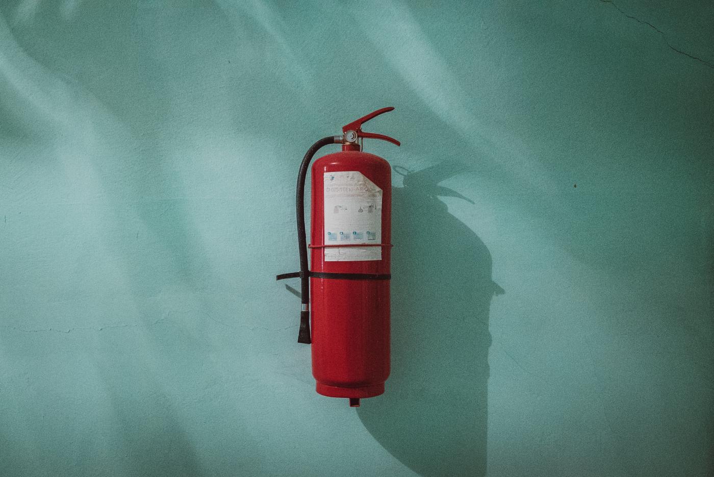 best fire extinguisher to use on a grease fire hanging on the wall