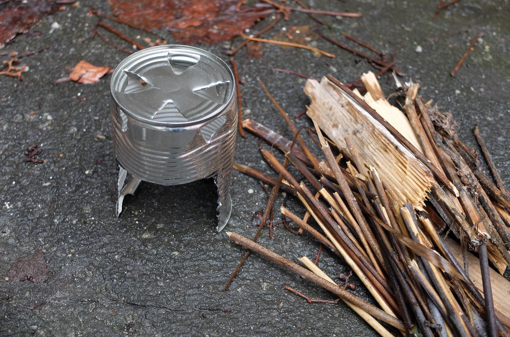 an emergency stove outside on pavement ready to be used during a crisis